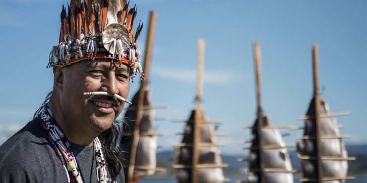 Coquille man wearing headdress at the Salmon Celebration